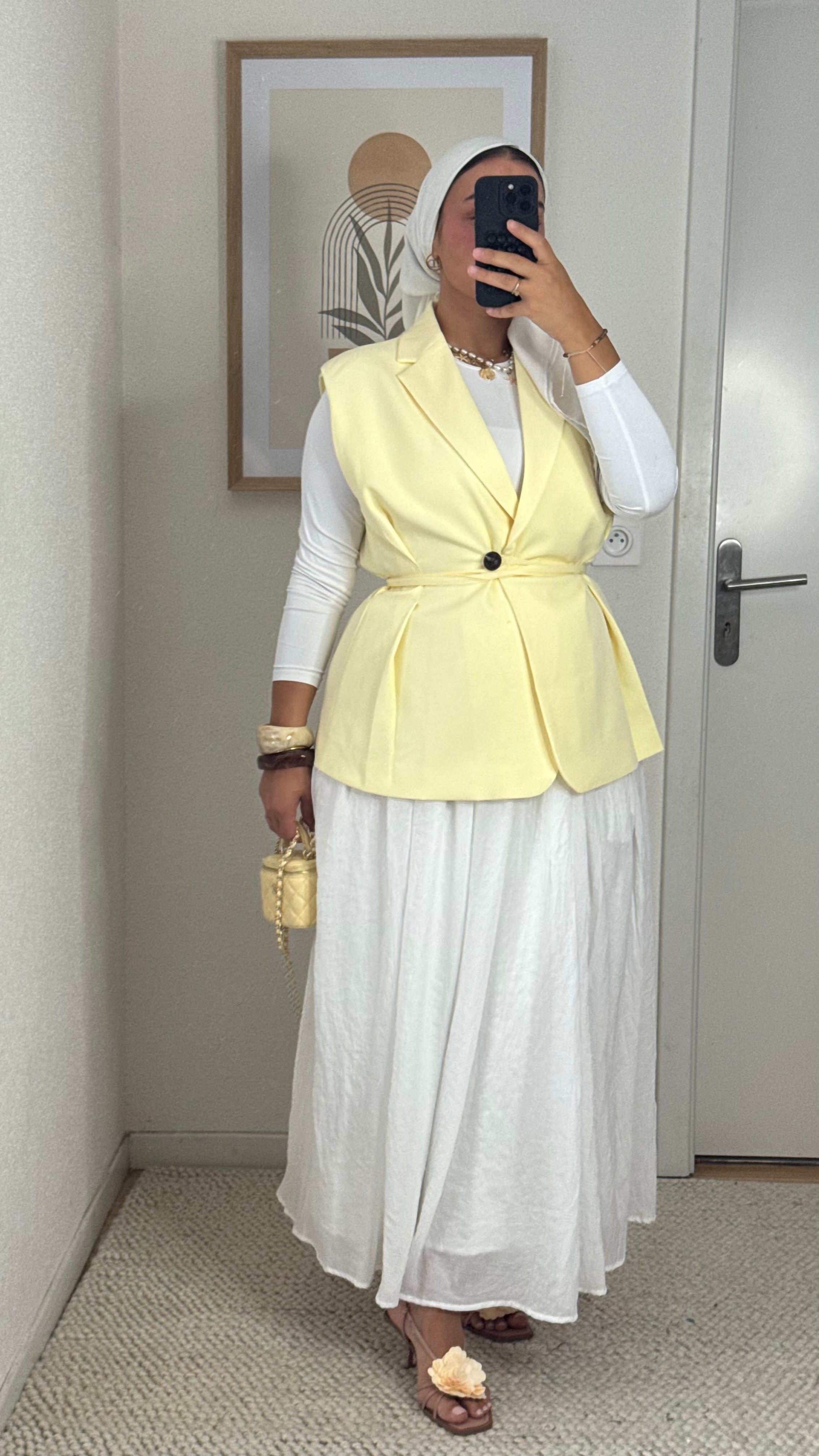 Lemon sleeveless blazer