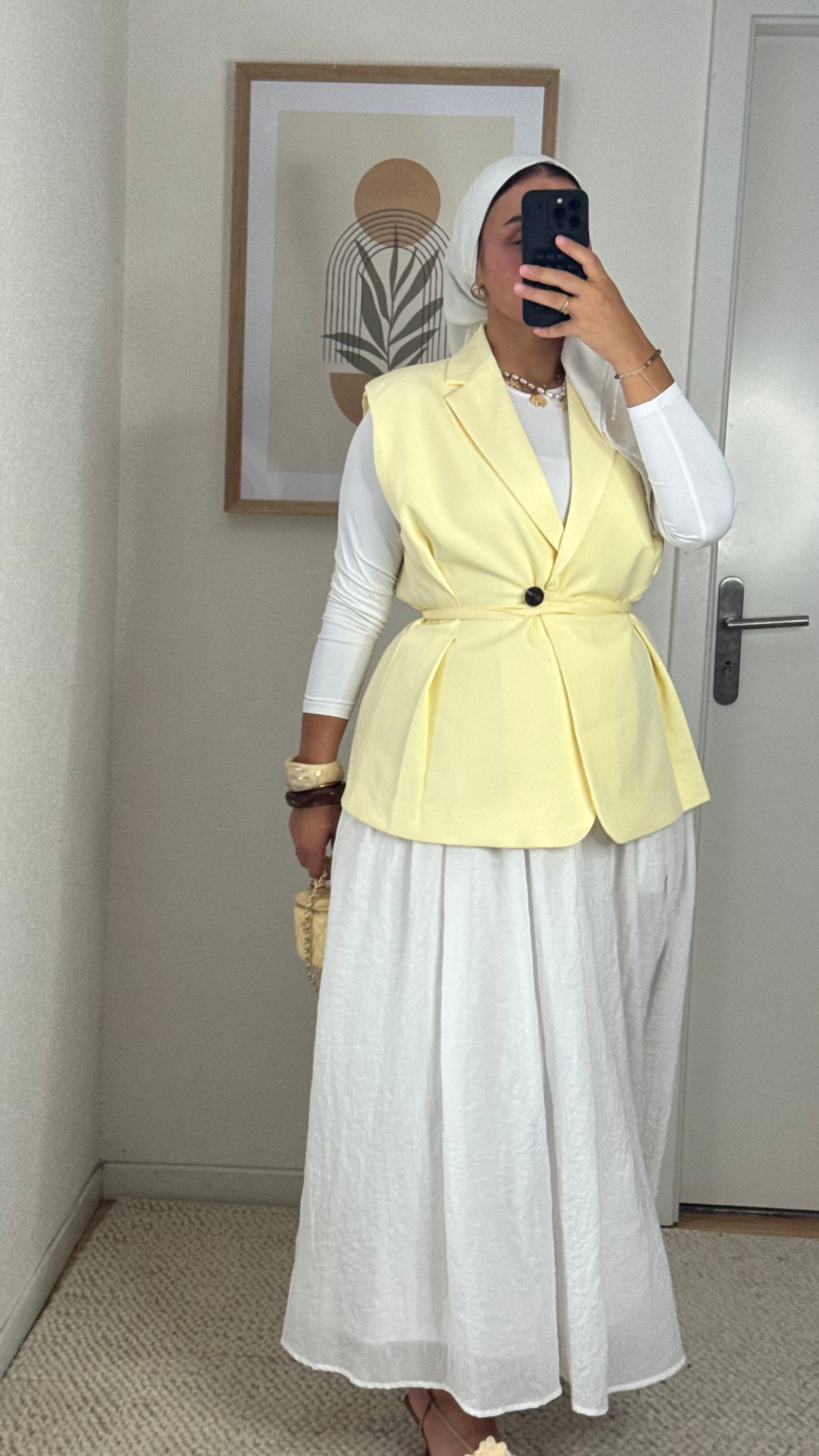 Lemon sleeveless blazer