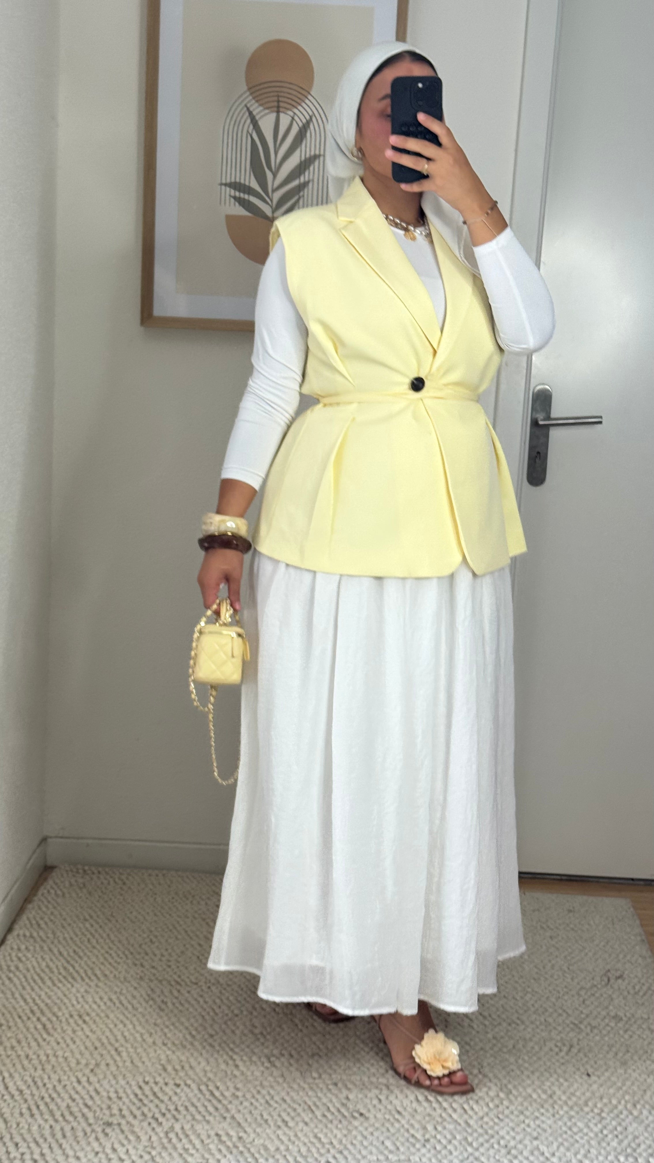 Lemon sleeveless blazer
